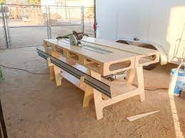 There aren't a lot of plans available on the. The Paulk Workbench Nice How The Tracks Store In Front Workbench Paulk Woodworking Diy Paulk Workbench Workbench Woodworking Workbench