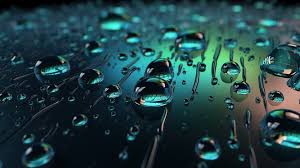 water drops floating on dark background