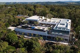 She is aaccompanied by one of her daughters (right) and two neighbours. Chris Hemsworth Byron Bay Mansion Is Almost Finished