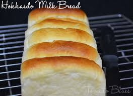 The bread tastes delicious and exceptionally milky. Hokkaido Milk Bread Recipe Yeast Bread Recipes Tomato Blues