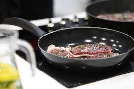 What are the advantages of using a nonstick pan when cooking?