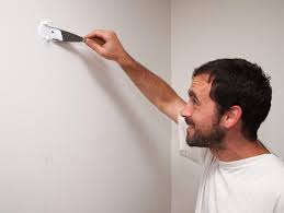 how to fill holes in wall mymove