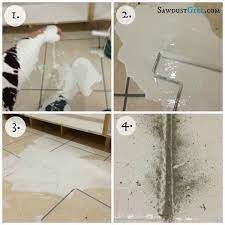 how to remove paint from grout and tile