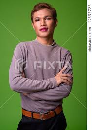 androgynous young asian man wearing