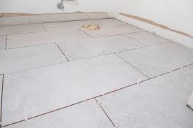 can you tile over linoleum flooring