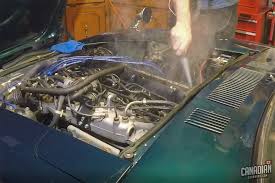 can you spray your engine bay with water