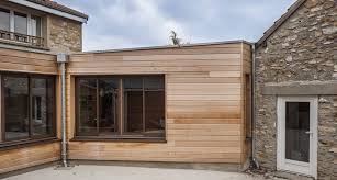 extension ossature bois toit plat