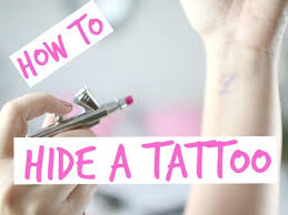 hide a tattoo with airbrush makeup