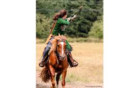 dressage rider to horseback archery