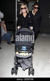 New mom Baby Spice (aka Emma Bunton) touches down in LA and receives the  Posh Spice treatment. Emma arrived with newborn son Beau and boyfriend Jade  Jones and was greated by a