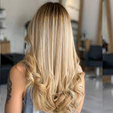 Take a 1 inch (2.5 cm) piece of hair and use the applicator brush to spread the bleach from the tips to about 1 inch (2.5 cm) from your scalp, leaving the roots untouched. 16 Best Golden Blonde Hair Color Ideas For Your Skin Tone