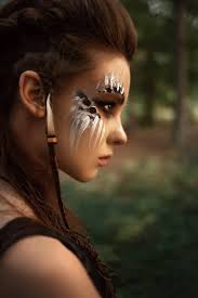 attractive female hunter with tribal