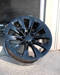 Like i had black powdercoat versus black painted. Tesla Model X Wheels Refinished In Gloss Black With Blue Flake