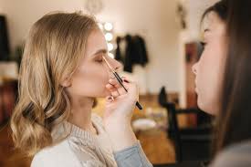makeup artist work in her beauty studio