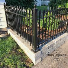 3ft wrought iron fence installed on top