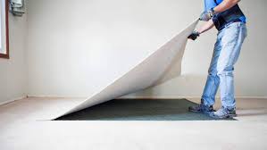 how to remove an old glued carpet yourself