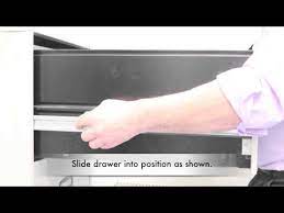 how to remove dresser drawer with