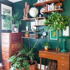 furniture paired with dark green walls