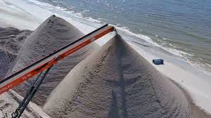 sand on fort myers beach being cleaned