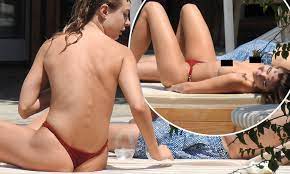Kimberley Garner goes topless as she sunbathes with in Mykonos | Daily Mail  Online
