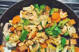 Based off the popular beef and broccoli, replacing the broccoli with cauliflower is a delicious alternative to cooking another vegetable. Vegetable Stir Fry With Carrots Broccoli And Cauliflower Divine Healthy Food