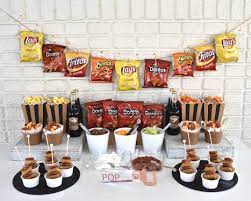 Once you've chosen your centerpieces, decorate with other details like photo books and diy photo boards. Create A Walking Taco Bar For Your Next Celebration