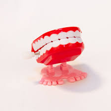 walking jumping teeth toy wind up toys