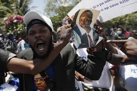Hundreds greet Aristide on return to troubled Haiti - Los Angeles Times