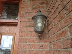 exterior lights mounted in brick veneer