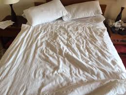 double bed with twin bed blanket