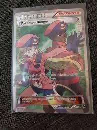 A trainer card is a type of card that can be played in the pokemon trading card game. Mavin Pokemon Ranger Trainer Card