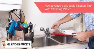 double kitchen sink with standing water