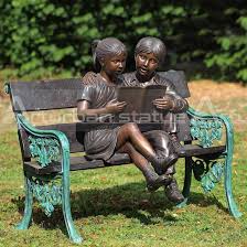 Girl Reading Book Statue Sitting On A Bench