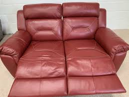red leather power reclining 2 seater