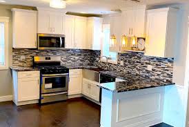 black countertops with white cabinets