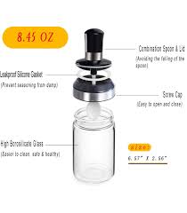 Rest the middle step of the fulcrum on the lip of the bottleneck and firmly pull away from the bottle with the handle, lifting the cork halfway out of the bottle. Spice Bottle With Oil Brush Honey Lid Spoon Cover Jar Mart One