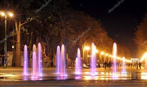 Colored Water Fountain At Night