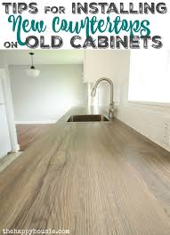Use a screwdriver to remove each of the cabinet doors from the cabinets. How To Install New Countertops On Old Cabinets The Happy Housie