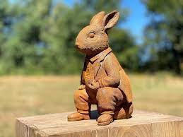 Garden Sculpture Of A Rabbit With A