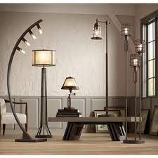 From its adjustable arm right down to its small base, it's a great choice for saving on square footage. Samuel Swing Arm Desk Lamp With Mica Shade And Usb Port 6t629 Lamps Plus Rustic Floor Lamps Bronze Floor Lamp Industrial Floor Lamps