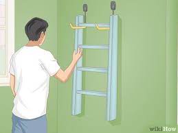 Simple Ways To Hang A Ladder On A Wall