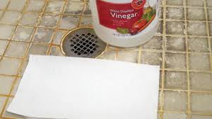 remove hard water stains from tile