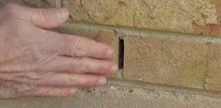 sealing weep holes in brick walls