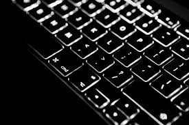 backlit black mac keyboard royalty free