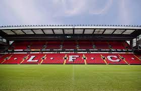 This historic playing field has seen some of football's biggest stars rise and fall, and you can explore its history with a stadium tour. Liverpool Fc Anfield Stadium Wallpaper Mural Hovia