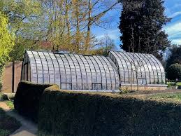 Greenhouse On Slope With Terraced