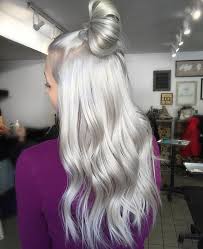 Hair dyeing is one way to stand out of the crowds. T3 Micro On Instagram She S A Silver Fox Silky Top Knot Via Josievilay Silver Blonde Hair Grey Hair Color Silver Silver Blonde