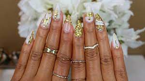gold glitter sculpted acrylic nails