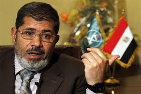 Mohamed Morsi by Mohamed AbdelGhany:Reuters - Mohamed-Morsi-by-Mohamed-AbdelGhanyReuters