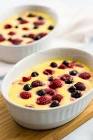 baked custard with berries